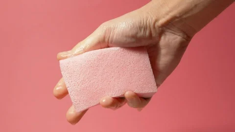 Pink Sponge squeezed by a male 스톡 동영상 124698033