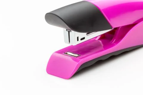 Pink Stapler close up on a white background. Stock Photos