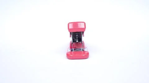 Pink stapler isolated white background Stock Photos