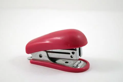 Pink Stapler isolated on white Stock Photos