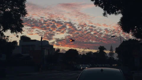 Pink Stratocumulus Clouds at Sunset Stock Footage 137971177