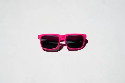 Pink sunglasses pattern on white background. Minimal summer concept. Isometri Stock Photos