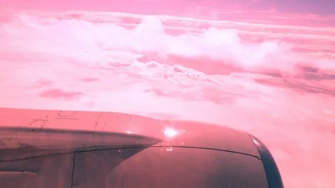 Pink sunrise plane flight clouds background copy space Stock Footage 115879762