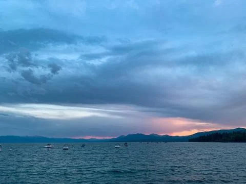 Pink Sunset and Dramatic Skies over Lake Tahoe Stock Photos