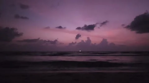 Pink Sunset Beach with High Waves. Cyberpunk color trend popular background. Stock Footage 236570828