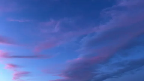 Pink Sunset Clouds Fading to Blue Hour Sky in Timelapse Stock Footage 341807239