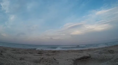 Pink Sunset at Miami Beach, Camera Slowly Sinks into Sand, is Picked Up Again 스톡 동영상 49778936