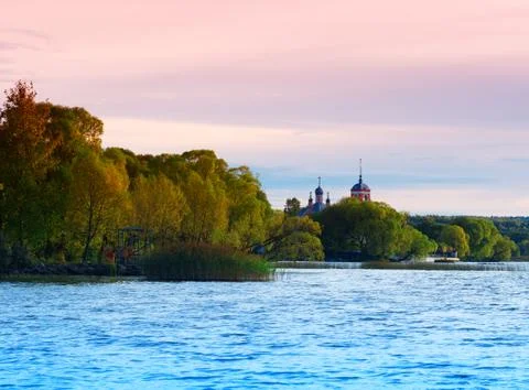 Pink sunset on monastery river background Foto stock