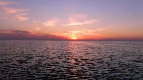 Pink sunset in the ocean Stock Footage 137919626