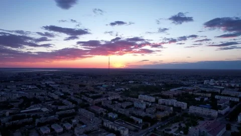 Pink sunset over a small town. Top view from drone Video stock 202631246