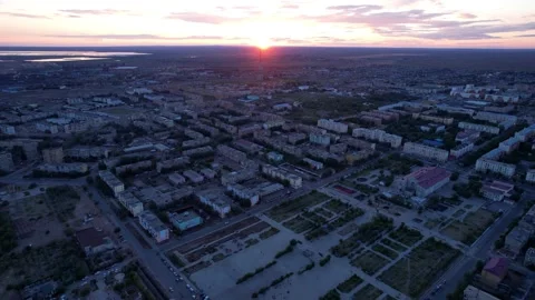Pink sunset over a small town. Top view from drone Vídeos de archivo 202632984