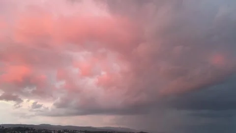 Pink Sunset Storm Clouds Over Distant Hills in Kartepe Stock Footage 344559601