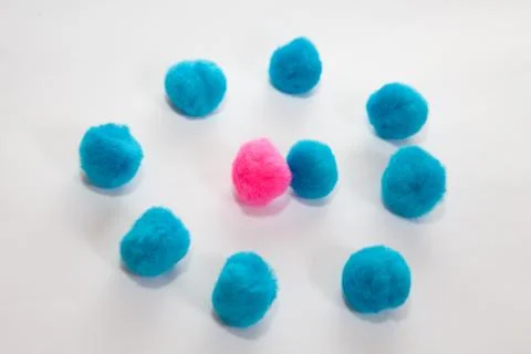 Pink surrounded by blues Stock Photos