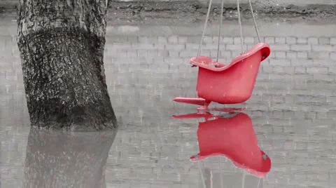 Pink swing on the tree in flooded yard. Abstract scene. Black, white and pink. Video stock 45919310