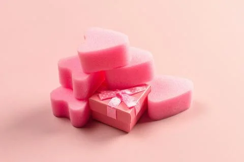 Pink tampons stringless with gift box on pink background. Stock Photos