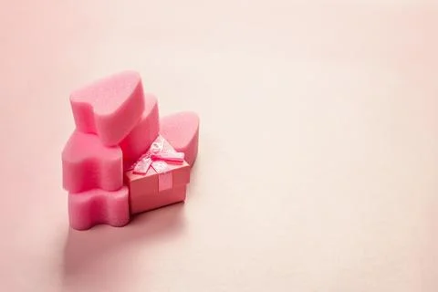 Pink tampons stringless with gift box on pink background. Stock Photos