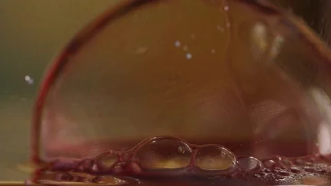 Pink-Tinted Bubble Popping MACRO Stock Footage 75558967