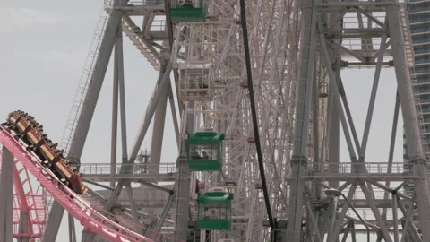 Pink Track - Diving Coaster Vanish - Yokohama Cosmo World - Yokohama - Japan Stock Footage 344092657
