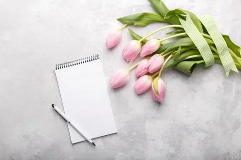 Pink tulips and notepad 写真素材