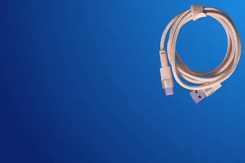 Pink USB cable for connection on blue gradient Stock Illustration