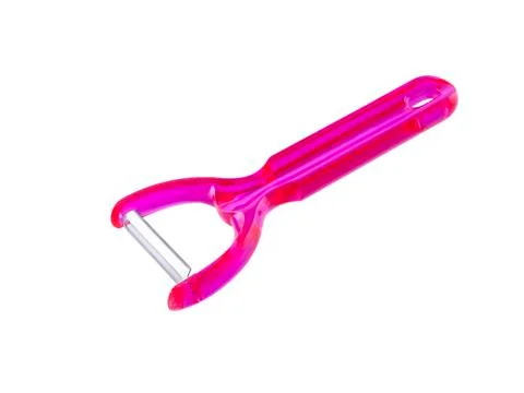 Pink vegetable peeler Foto stock