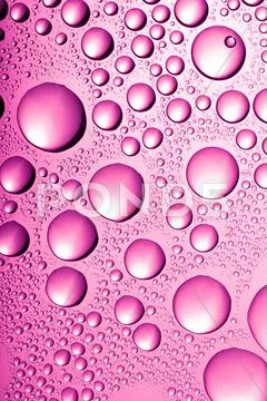 Pink water drops background Stock-Fotos