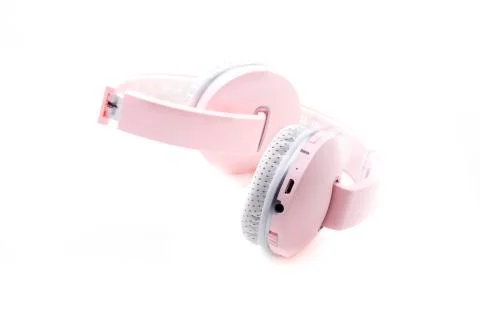 Pink wireless earphone Stock Photos