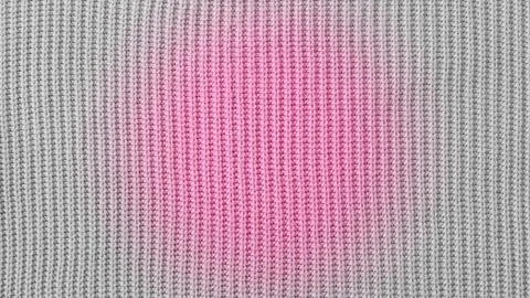 Pink Wool background from a textile material with Grey Vignette, closeup 스톡 사진