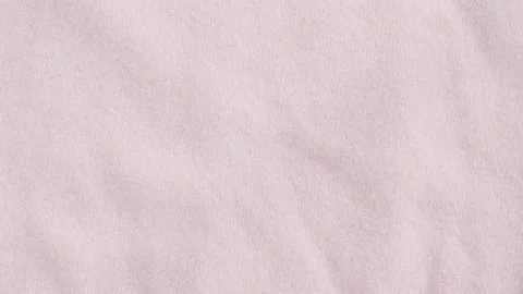 Pink wool knitted cloth Stock Footage 137656849
