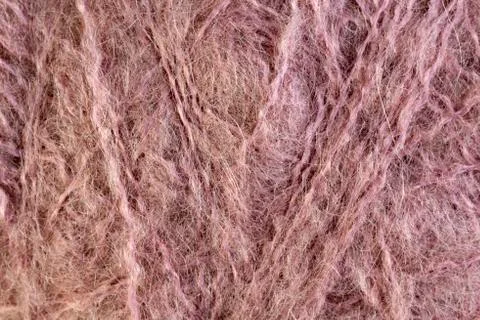 Pink wool thread ball macro closeup 写真素材