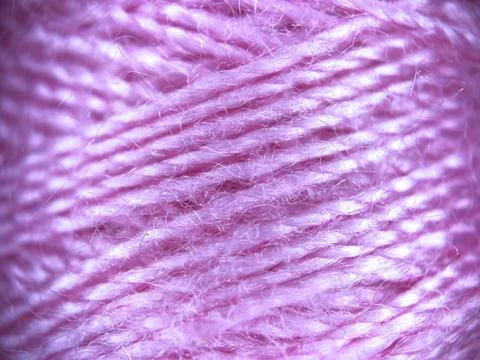 Pink yarn thread texture close up macro concept for knitting, textile industry, 库存照片