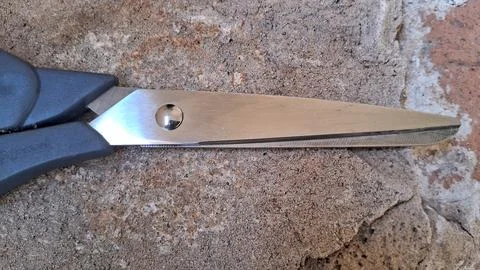 Pinking shears for fabric cutting. Zigzag scissors for sewing and craft Stock Photos