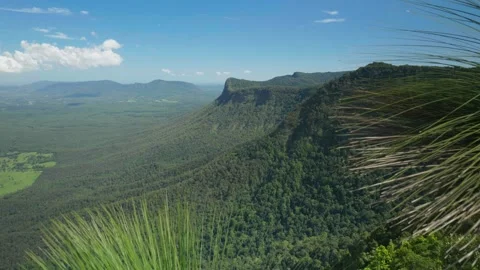 Pinnacle mountain range with Grass in foreground Stock Footage 297715608