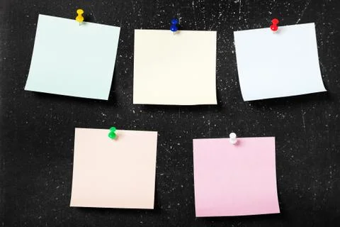 Pinned post-it paper note Stock Photos