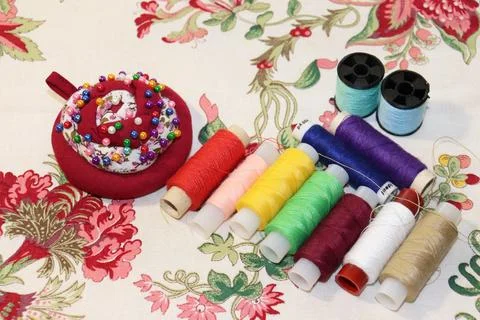 Pins and thread for sewing Stock Photos