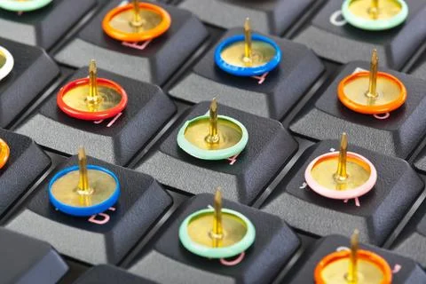 Pins on computer keyboard Pins on computer keyboard - concept background C... Foto stock