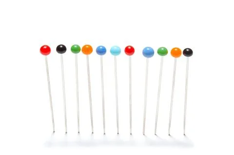 Pins in a row Foto stock