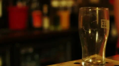 Pint of beer being served Stock Footage 21722026