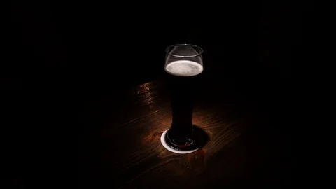 Pint of dark beer Stock Footage 122846085