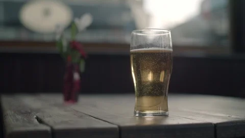 Pint Glass of Beer Stock Footage 119792428