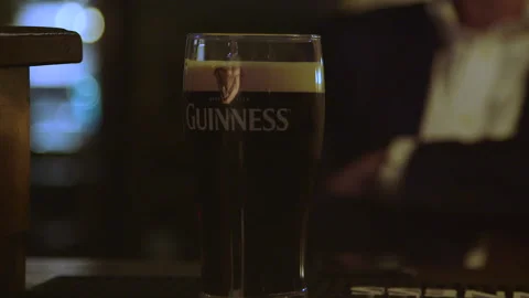 A pint of Guinness at the bar Stock Footage 235437055