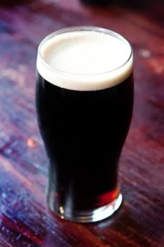 Pint of stout Stock-Fotos