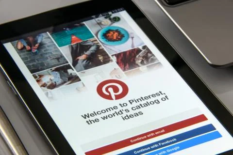 Pinterest app on smartphone Stock Photos