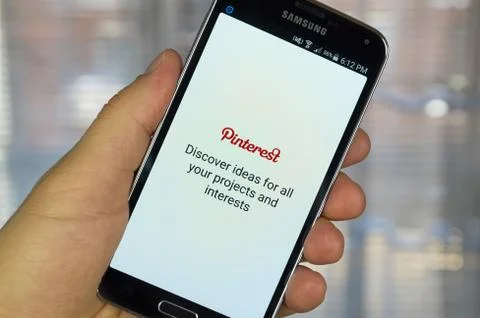 Pinterest application on android smartphone. Stock Photos