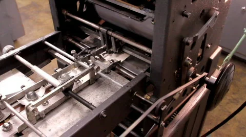 Pinting Press Feeding Stock Footage 594241