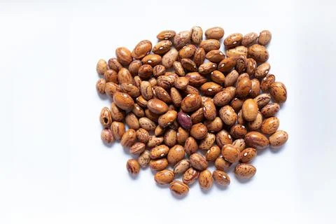 Pinto beans on the white background Stock Photos