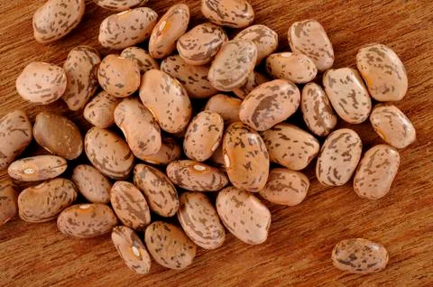 Pinto beans on wood Stock Photos