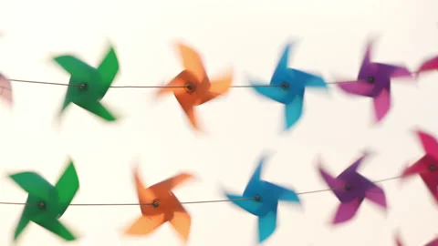 Pinwheel slow motion rotate from windy on white background Vídeo Stock 236411315