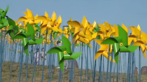 Pinwheel spinning in the wind Stock Footage 337147412
