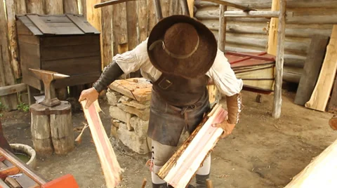 Pioneer splitting wood Stock Footage 30227019